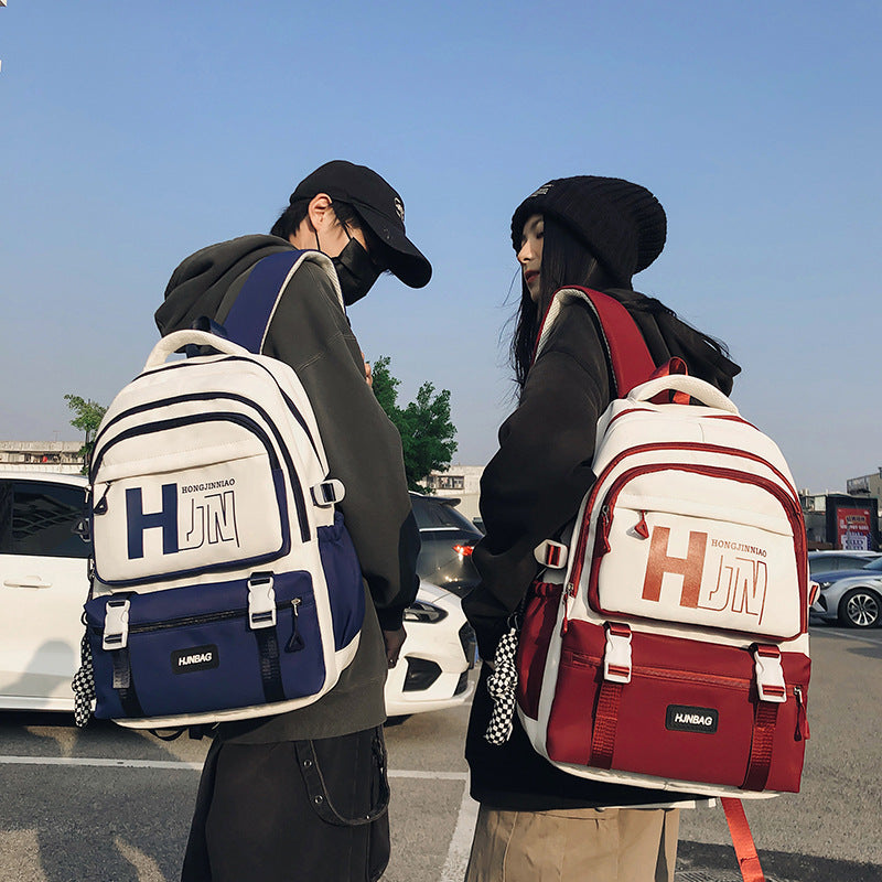 New backpack, junior high school, male and female students, campus schoolbag, large capacity, fashion trend, strong and durable leisure bag