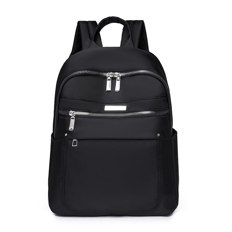 Solid color fashion casual versatile backpack simple trend lightweight business women's computer bag wholesale student schoolbag