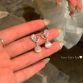 Minimalist heart-shaped stud earrings - e6105 silver