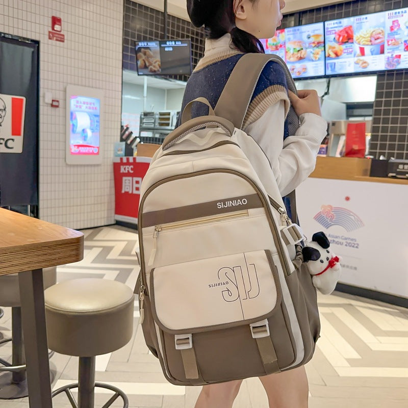 Large-capacity load reduction spine bag for female primary school students, junior high school students, high school students, college students, backpack for women 2023 new models
