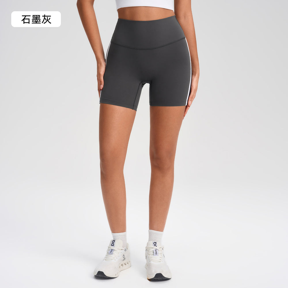 High-waisted, figure-hugging peach cutout shorts with color blocking and seamless design - perfect for running, fitness, and yoga (yg-1002)