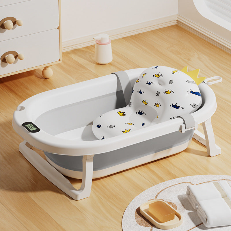 Newborn baby foldable bathtub with temperature-sensitive silicone plug, easy grip handles, and large capacity for baby bathing