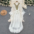 Fashionfashionableheavy industrylacepatchworkv neckbat sleeve strap waist dress women's vacation style tassel long skirt