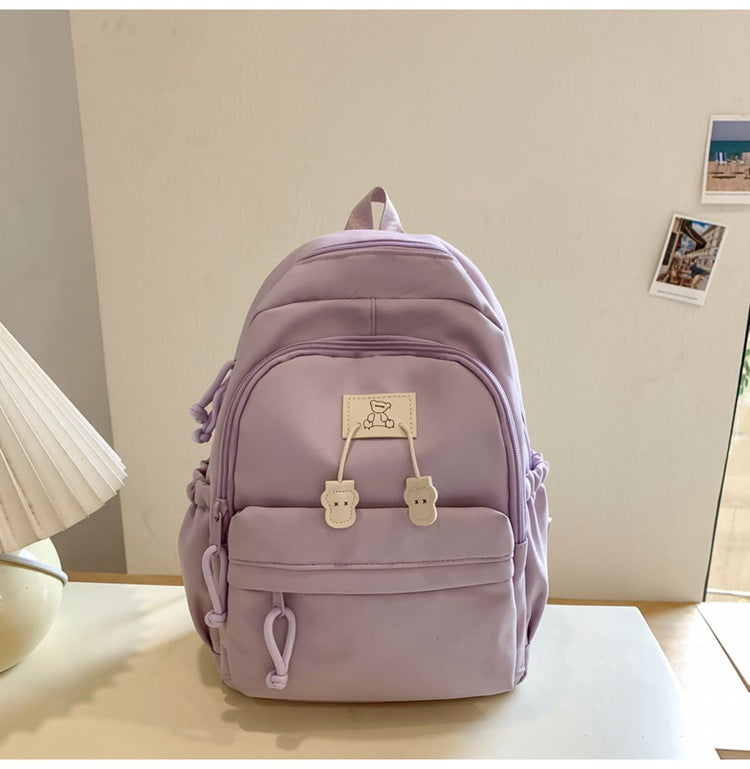 School bag female college student Korean version ins solid color simple and versatile junior high school student travel small backpack high school student backpack