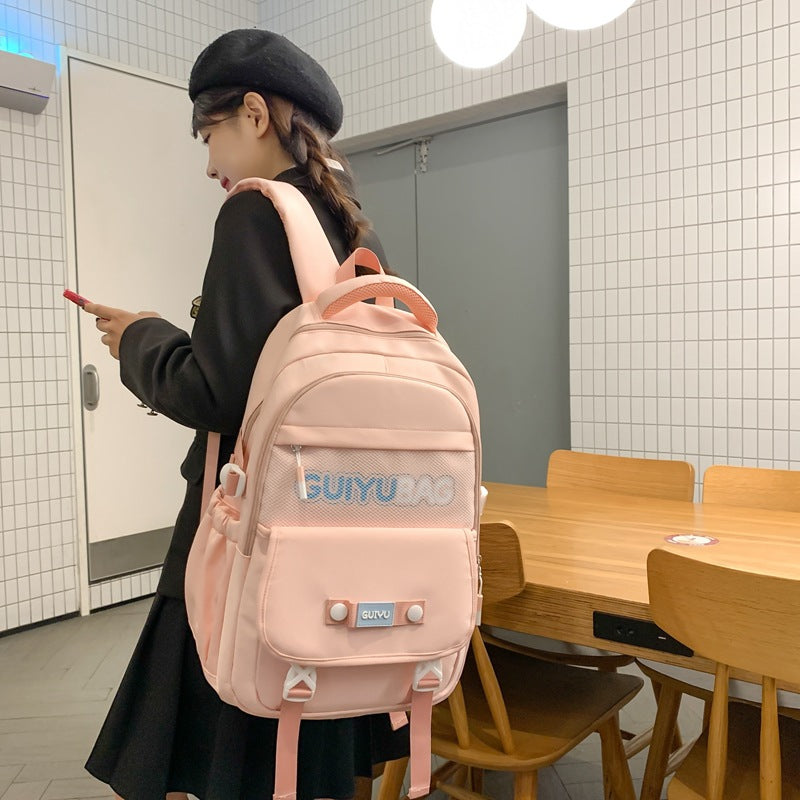 New schoolbag female middle school students simple and versatile large capacity fashion solid color backpack high school students college style backpack