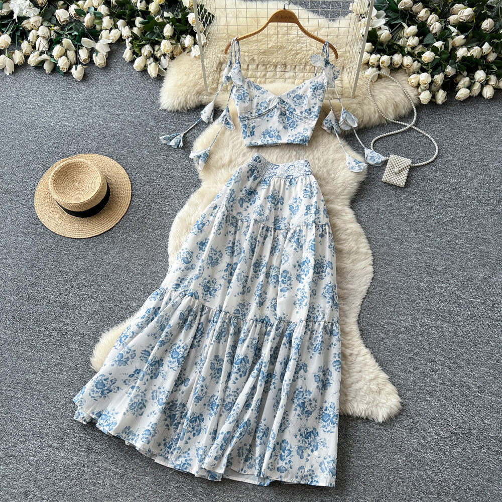 Vacation-ready blue floral two-piece set: women's summer high-waisted maxi skirt outfit - perfect for a garden getaway