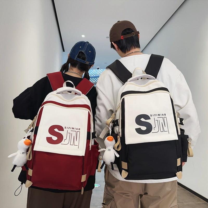 School bag female Japanese tooling style high school student junior high school student contrasting color backpack American retro large-capacity backpack male