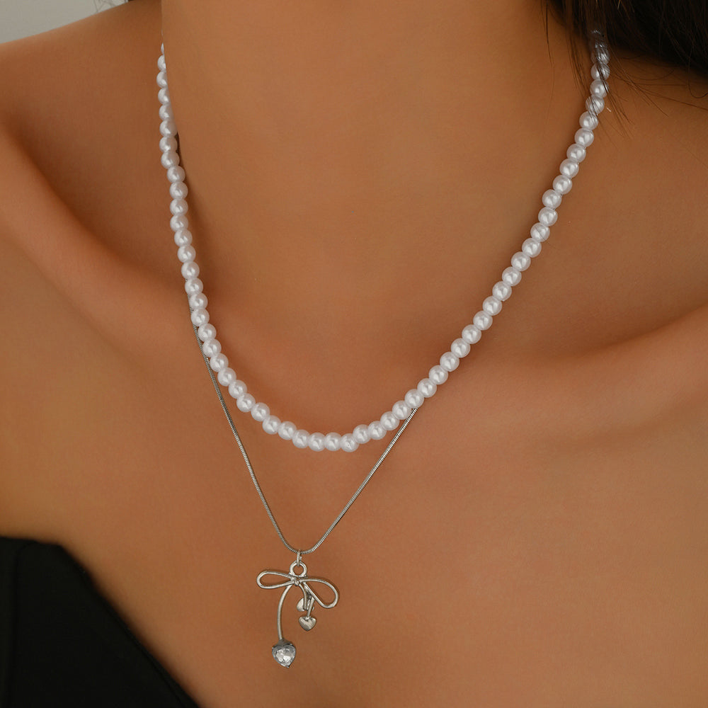 French style stacked pearl necklace wholesale european and american cross-border retro necklace accessible luxury high-end bow clavicle chain for women