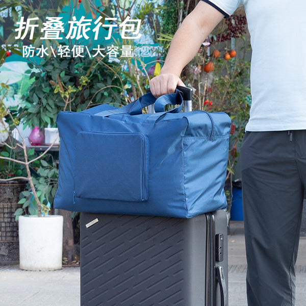 Large-capacity folding travel bag, short-distance portable duffel bag, trolley case, business trip travel clothes storage bag