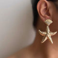 Wholesale gold earrings - european & american style irregular starfish earrings for women - beach vacation pleated texture statement studs