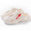White - coconut clogs - with red tag