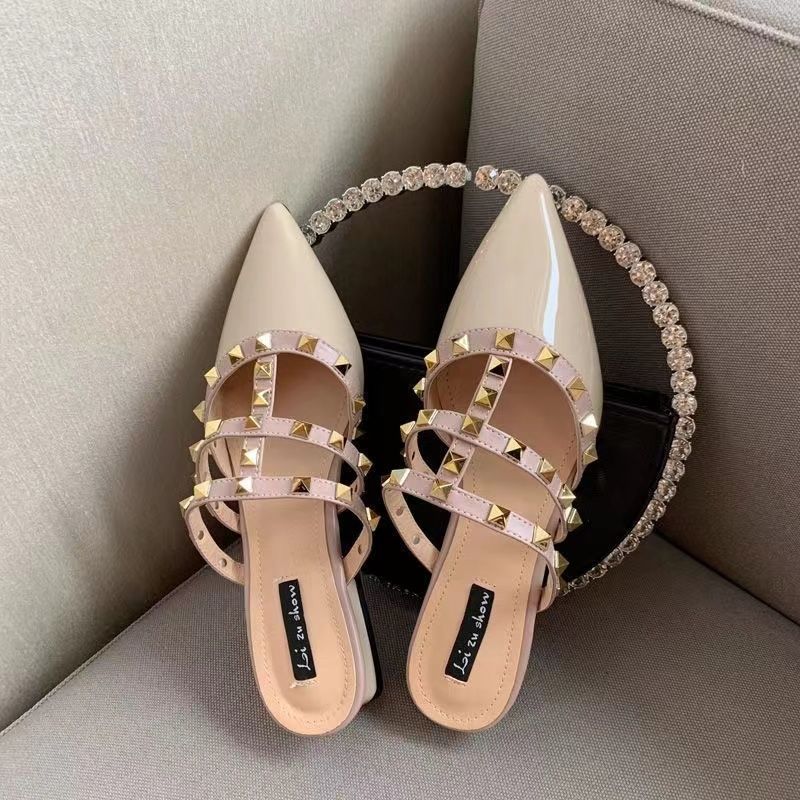 Frenchclassy sense of rivets toe-cap half slippers for women spring and summerflatsoutwear2025k-style patent leather pointed toe sandals