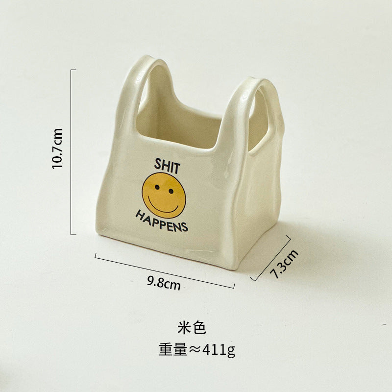Personalized hand pinch bag desktop creative ceramic pen holder remote control stationery storage box makeup pen storage bucket small ornament