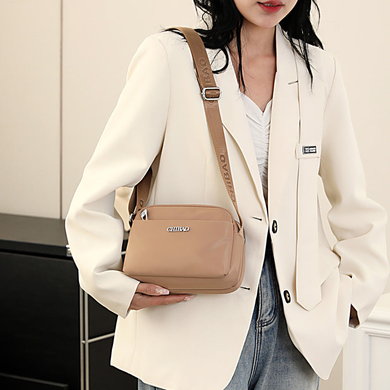 Foreign trade new lightweight messenger bag bag women's solid color simple nylon cloth casual shoulder bag portable commuter small square bag