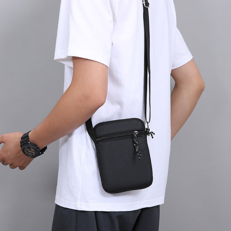 Foreign trade new light and portable shoulder bag men's casual simple mobile phone canvas bag outdoor trendy messenger bag