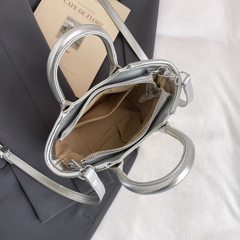 Handheld bucket bag women's new sense niche this year messenger bag fashion trend small bag