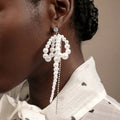 European and american cross-border retro trend imitation pearl earrings - unique irregular bow chain tassel beaded stud earrings for women