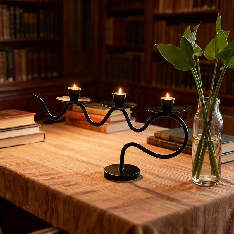 European retro minimalist wavy iron candle holder with electronic candles for a romantic ambiance in living room or dining table