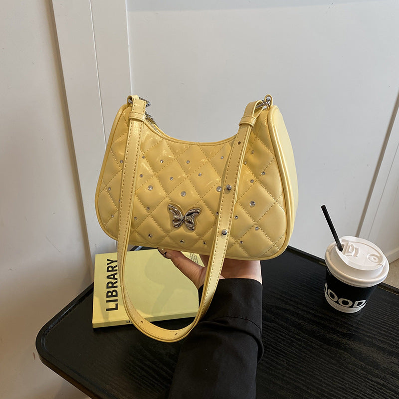 Foreign style simple rhombus single shoulder armpit bag women 2025 new high-end niche diamond-encrusted messenger bag wholesale