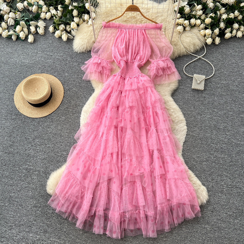 Sweet and lovely pink mesh dress for women, perfect for summer. features an off-the-shoulder design, puff sleeves, a high waist, and an a-line silhouette. an ethereal, fairy-tale style