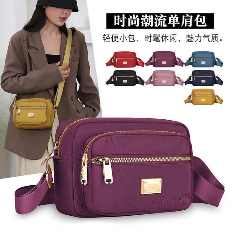 Portable commuter small square bag multi-layer storage business cashier bag simple and durable Oxford cloth shoulder messenger bag wholesale