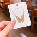 [titanium steel] internet celebrity new butterfly necklace for women electroplated hollow high-end copper micro-embedded light luxury sweater chain jewelry