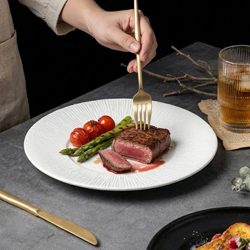 Nordic minimalist black and white ceramic steak plate - western dinner plate for restaurant, home, and hotel use - flat plate with unique creative presentation