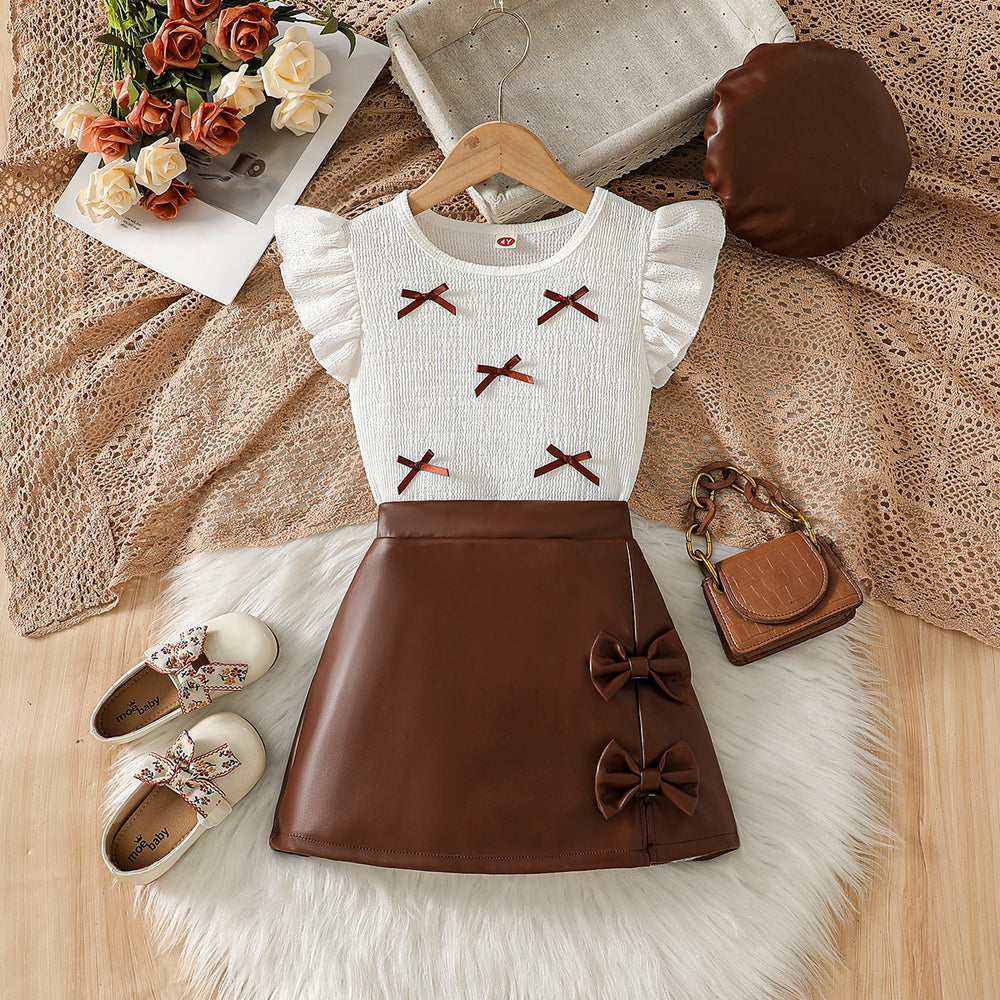 cross-border girls' spring/summer new collection: bow-embellished textured top + pu leather a-line skirt with matching hat - 3-piece set