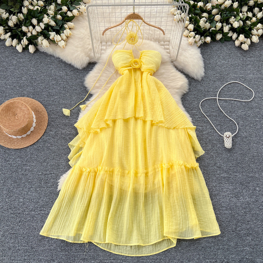 Beach vacation dress for women, atmospheric cut out, breast-revealing halter suspender, stereo flower, asymmetrical fairy long skirt