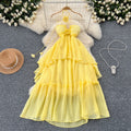 Beach vacation dress for women, atmospheric cut out, breast-revealing halter suspender, stereo flower, asymmetrical fairy long skirt
