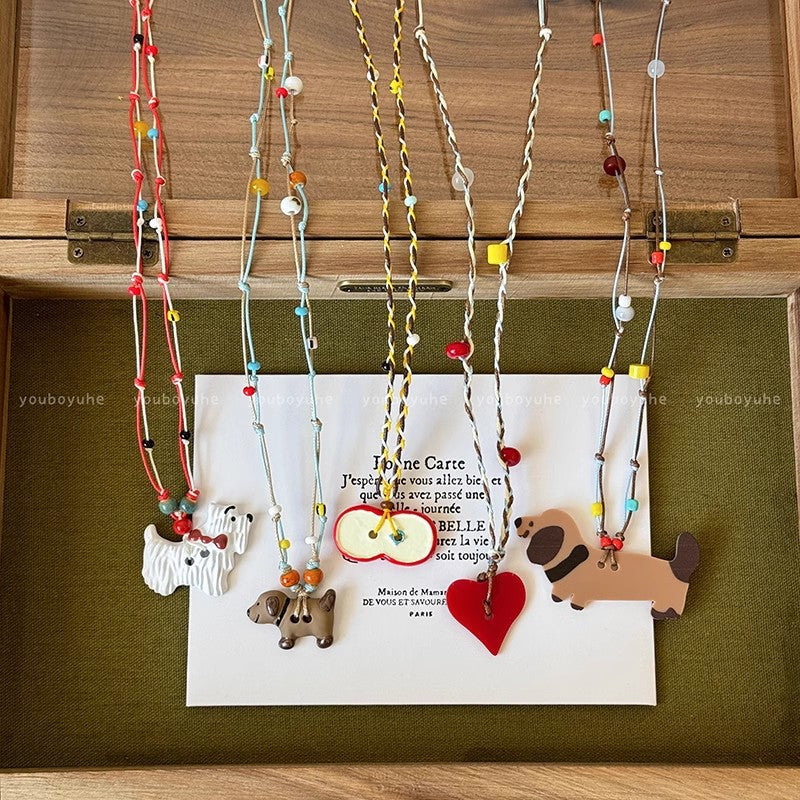 Cute puppy pendant necklace, perfect for summer. a colorful dopamine necklace, long enough to wear with hoodies or as a skirt accessory