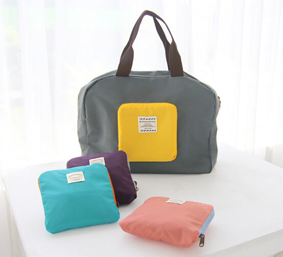 Folding travel storage bag second generation contrasting colors going out portable handbag clothes quilt storage bag travel bag