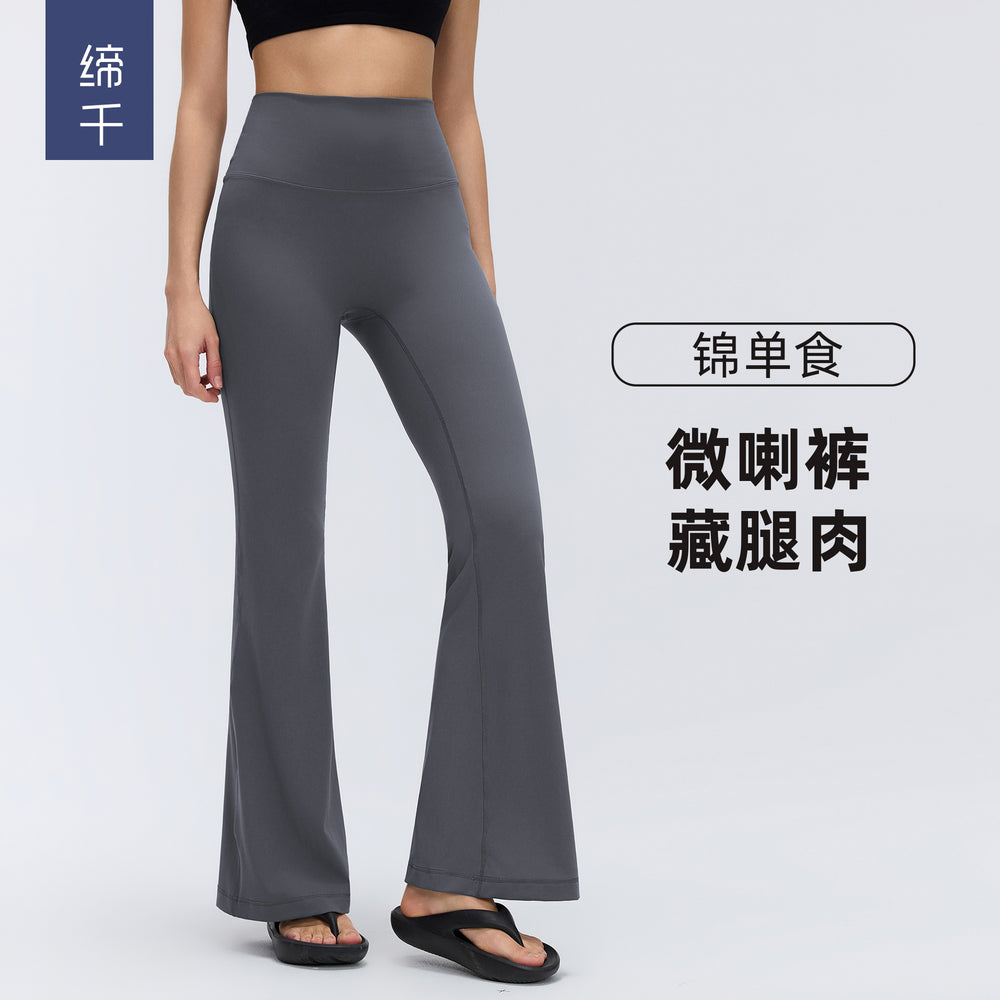 High-waisted, slightly flared yoga pants for women, designed to lift the hips, flatten the tummy, and create a slimming silhouette. these stretchy, barely-there feel leggings are perfect for pilates and other fitness activities. style d26017
