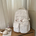 Japanese-inspired, minimalist, and trendy backpack for women. features a delicate floral design, perfect for casual use, school, or class. a versatile, large-capacity backpack that's easy to match with any outfit