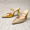 Women's gold heeled sandals - party shoes with unique heel, chain detail, pointed toe, color block design, and minimalist high heels