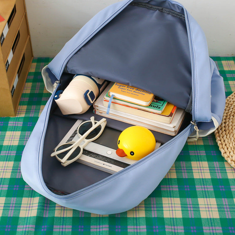 New casual middle school student schoolbag trendy brand large-capacity solid color backpack four-piece high-value backpack men