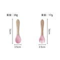 Light pink wooden handle fork and spoon