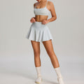 Amazon's new fashion tape yoga sports suit women's outdoor badminton fitness wear flap pocket pants tennis skirt suit
