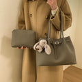 Simple and high-end large-capacity bag for women, new 2025 autumn/winter casual versatile commuter bag, single shoulder mother-and-child bag
