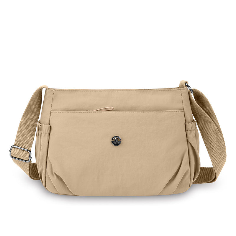 Simple new solid color shoulder bag women's light casual versatile outdoor small square bag fashionable commuter pleated messenger bag