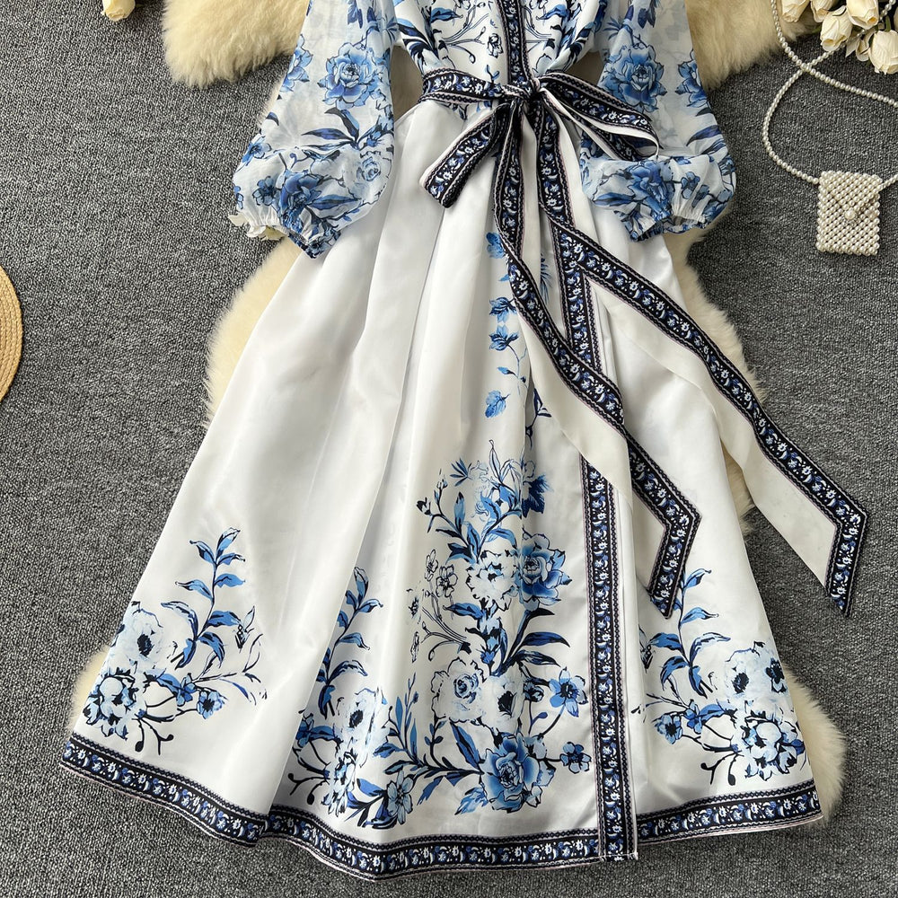 European and american retro court style printed dress - women's designer cinched waist tie-up v-neck lantern sleeve knee-length evening gown