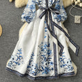 European and american retro court style printed dress - women's designer cinched waist tie-up v-neck lantern sleeve knee-length evening gown
