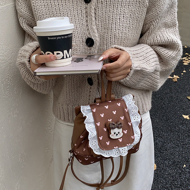 Sweet and cute fashion flip-top backpack for female students, new autumn and winter lace schoolbag, cartoon girl backpack