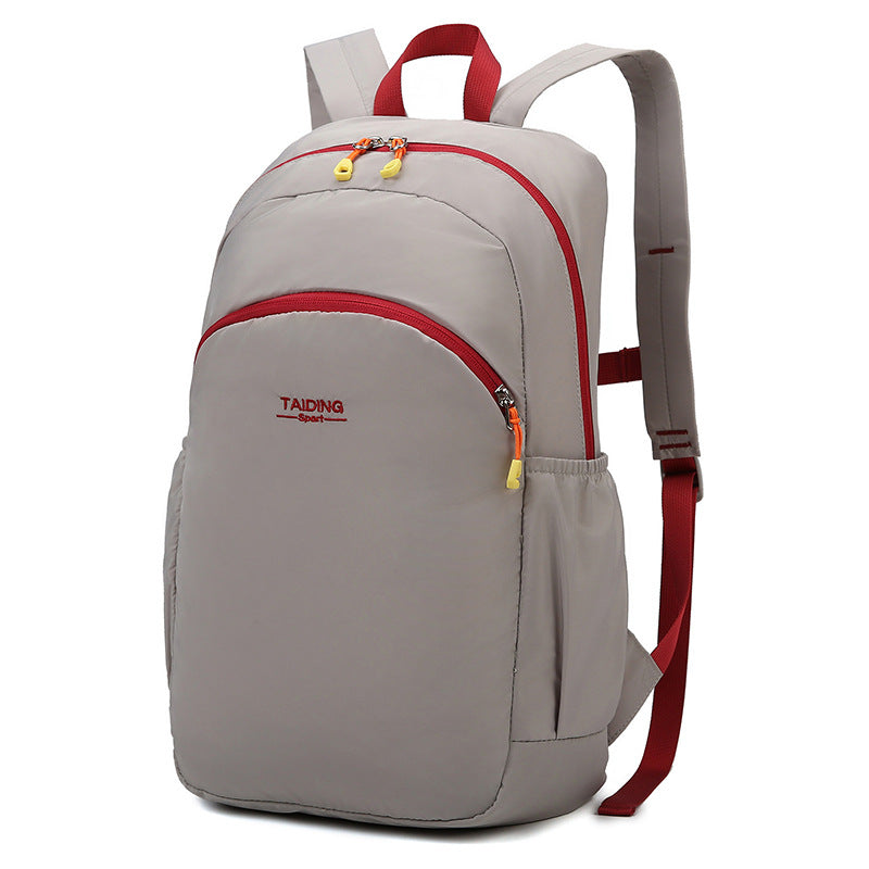 New foldable storage backpack women's travel bag simple casual nylon lightweight outdoor backpack schoolbag