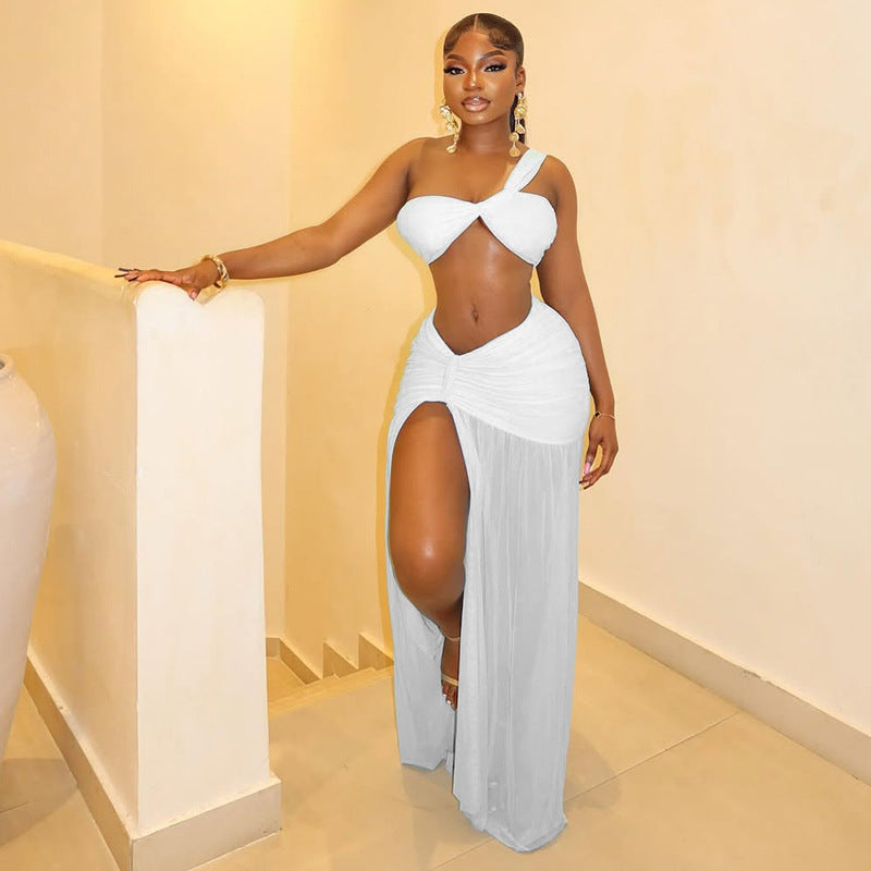 Fashion styleexportpure color vacation navel-baring design skirt suit slit hip-covering chest-wrapping one-shoulder two-piece set women's clothing trend