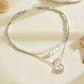 Wholesale faux pearl necklaces: european & american fashion, vintage-inspired, understated luxury, unique & high-end, choker necklaces with star pendants for women