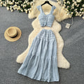 Age-reducing fresh spring and summer holiday style short small flying sleeve suspender tops + high waist pleated skirt two-piece set