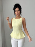 Sleeveless, waist-cinching top for women, featuring a ruffled hem, open back, and bow tie closure. a versatile and stylish piece perfect for everyday wear