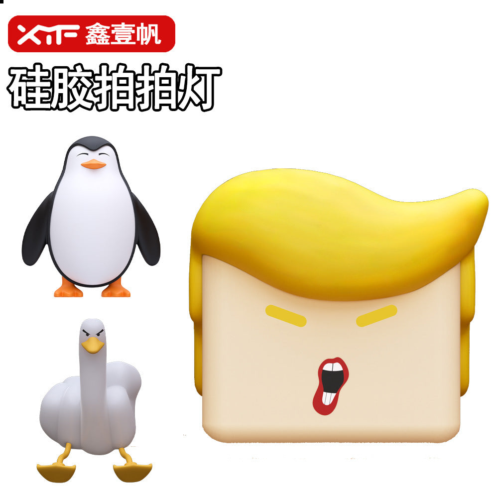 Cross-border creative silicone night light usb charging pat light bedroom bedside mobile phone holder middle finger duck desk lamp