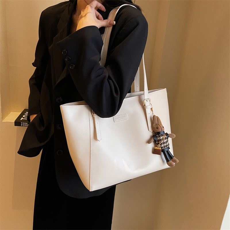 Cross-border large-capacity bags, women's autumn and winter versatile 2025 new shoulder bag, college student class bag, commuter tote bag